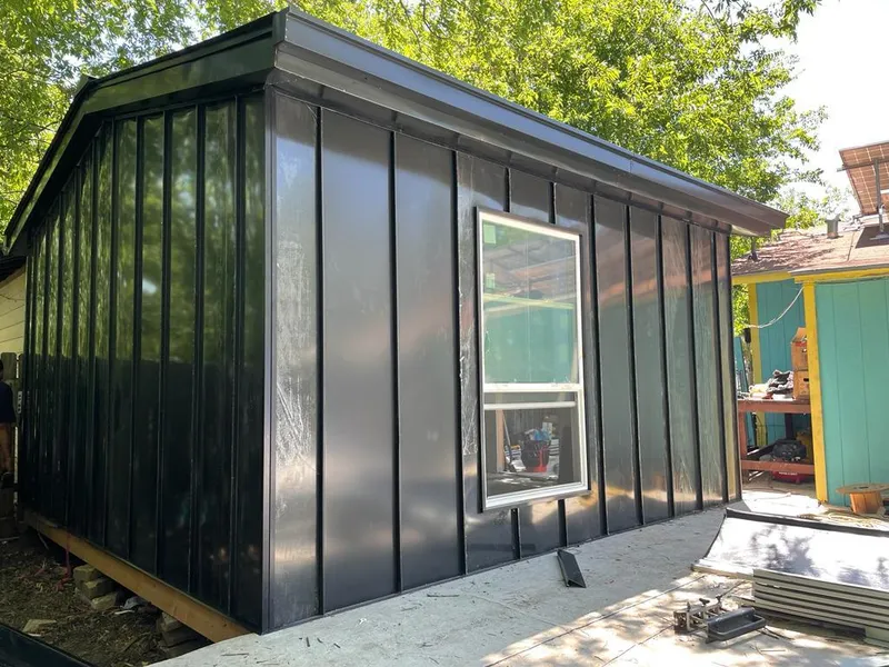 Black standing seam metal wall panels for Roof Inspection in Newnan